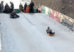 Child sledding at Winter Jam NYC