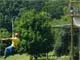 Person on high rope course elements