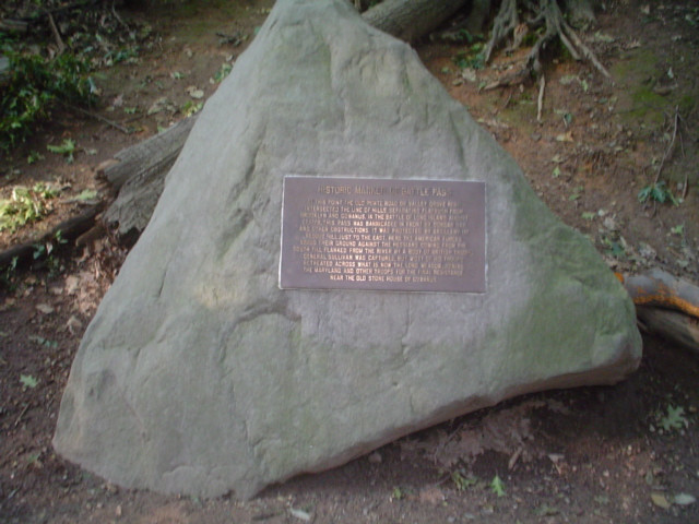 Plaque mounted on boulder