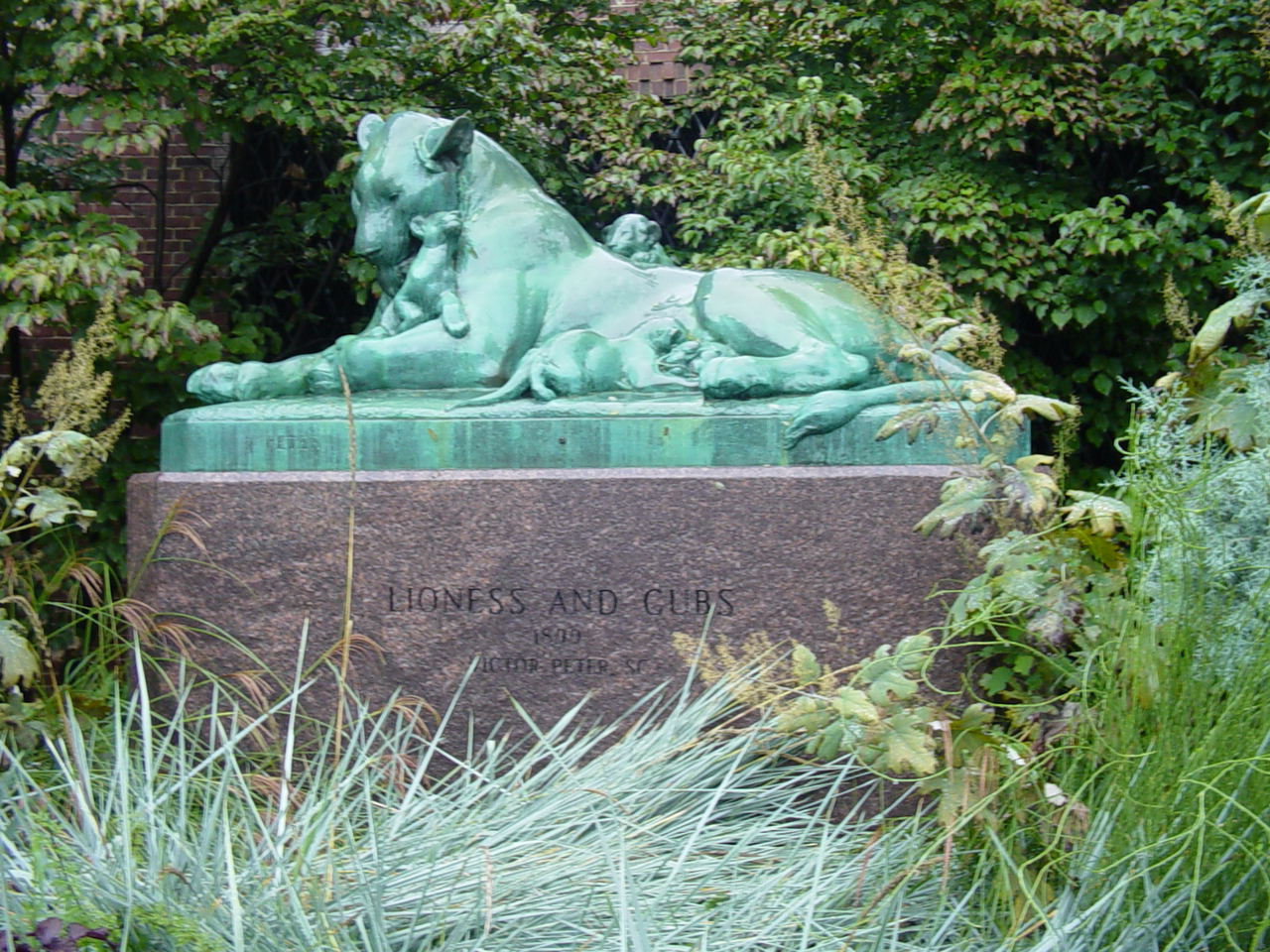 Group on integral plinth on pedestal