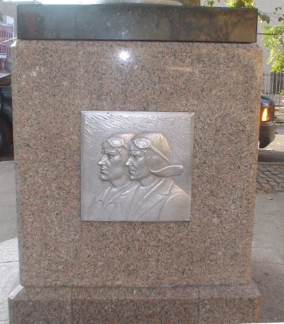 Flagstaff base with relief plaque