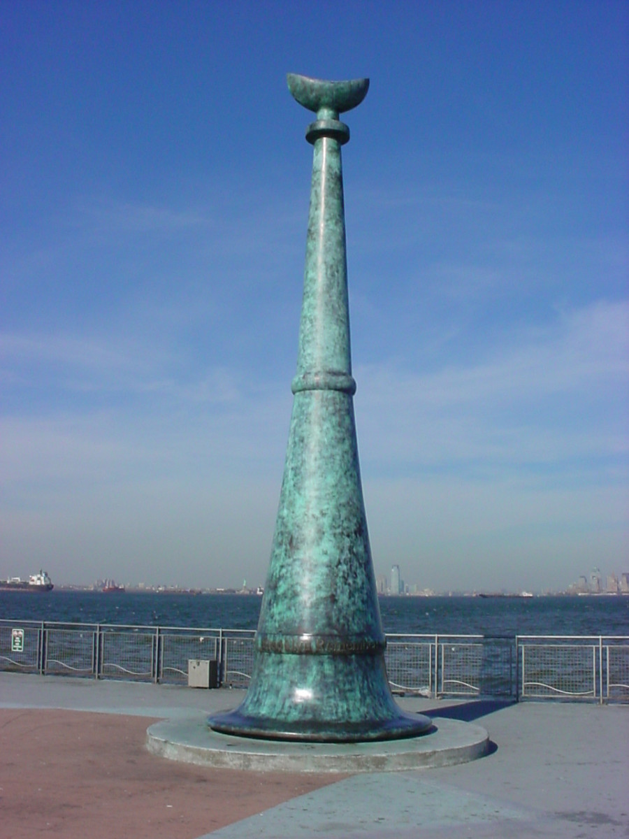 Over-life size sculpture, symbolic speaking-trumpet, with interior lamp; on concrete plinth