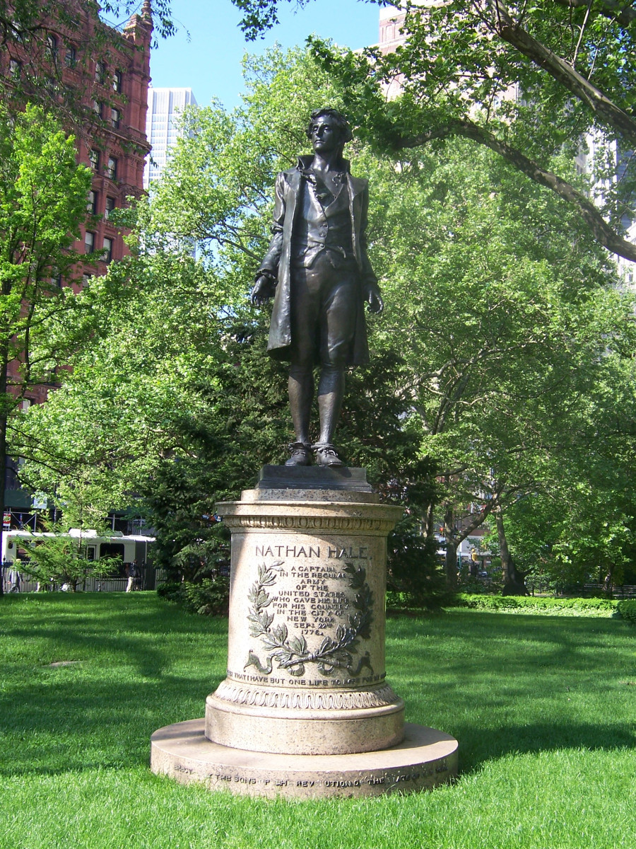 Figure (heroic scale) on pedestal, bandeau at base