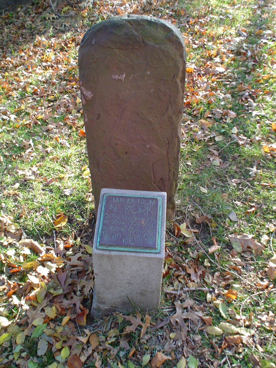 Marker on base, plaque