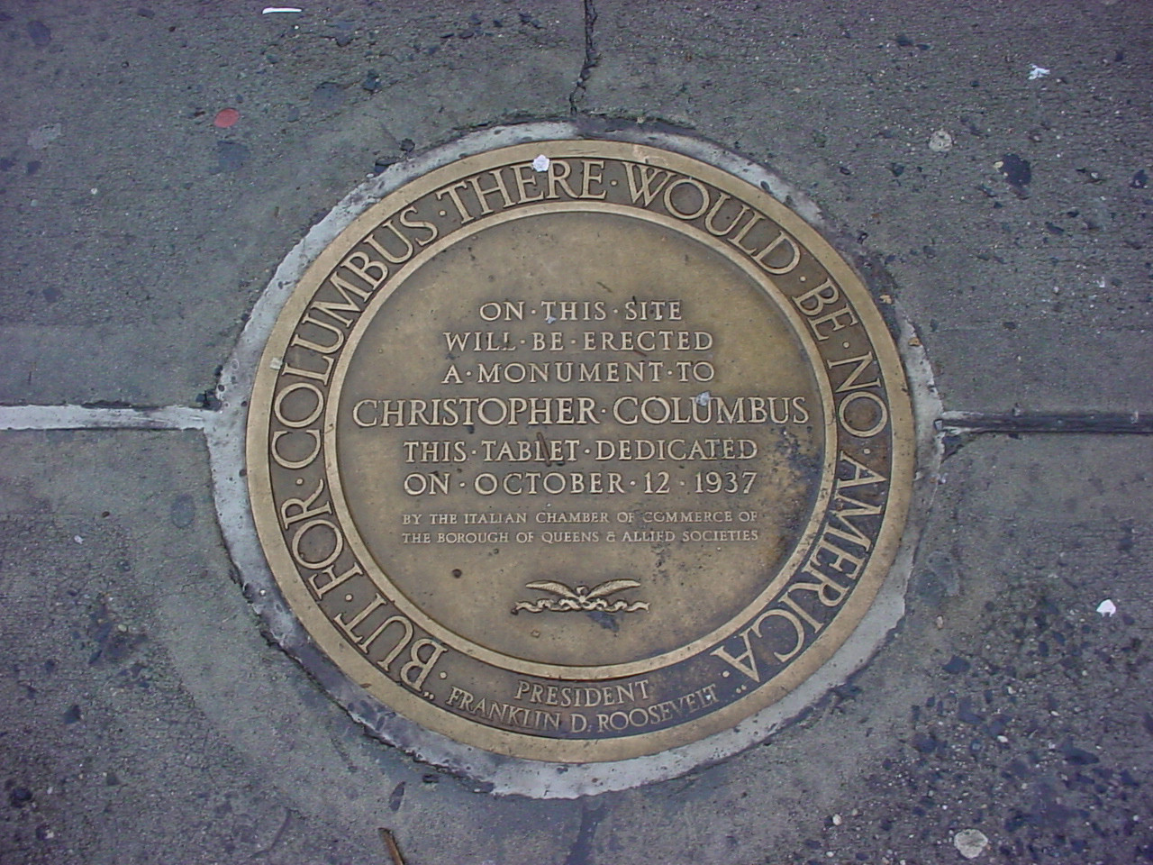 Circular tablet set in pavement