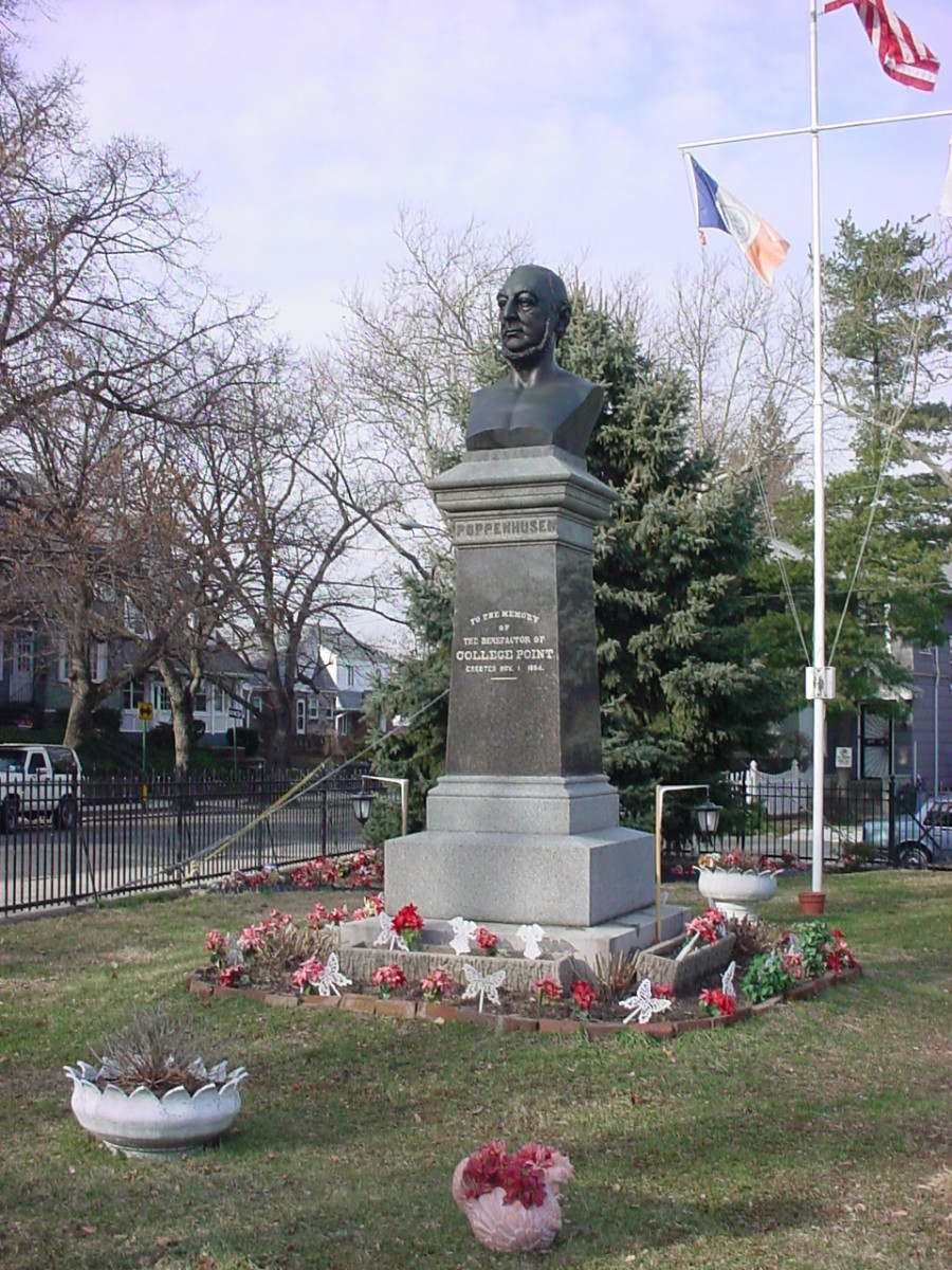 Bust on pedestal on stepped base