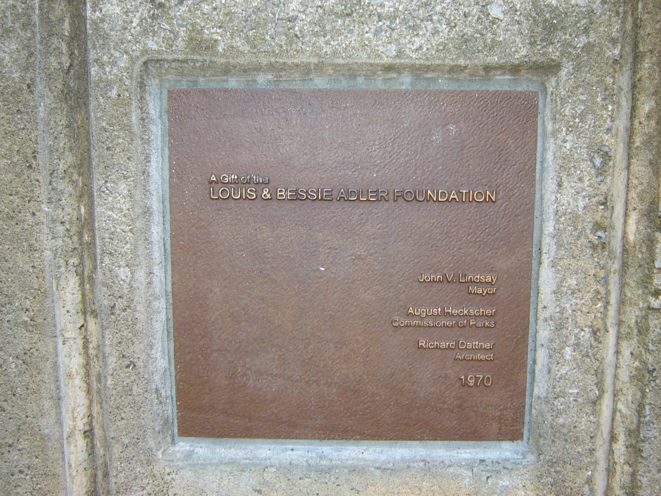 Tablet recessed in concrete wall