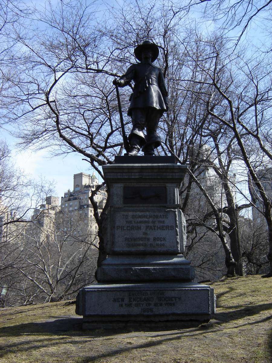 Statue, pedestal with sculptural panel