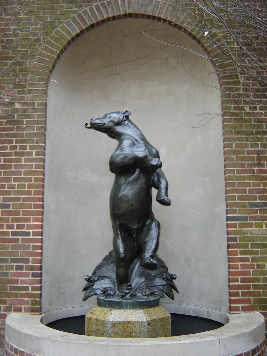 Fountain figure on ornamented integral plinth