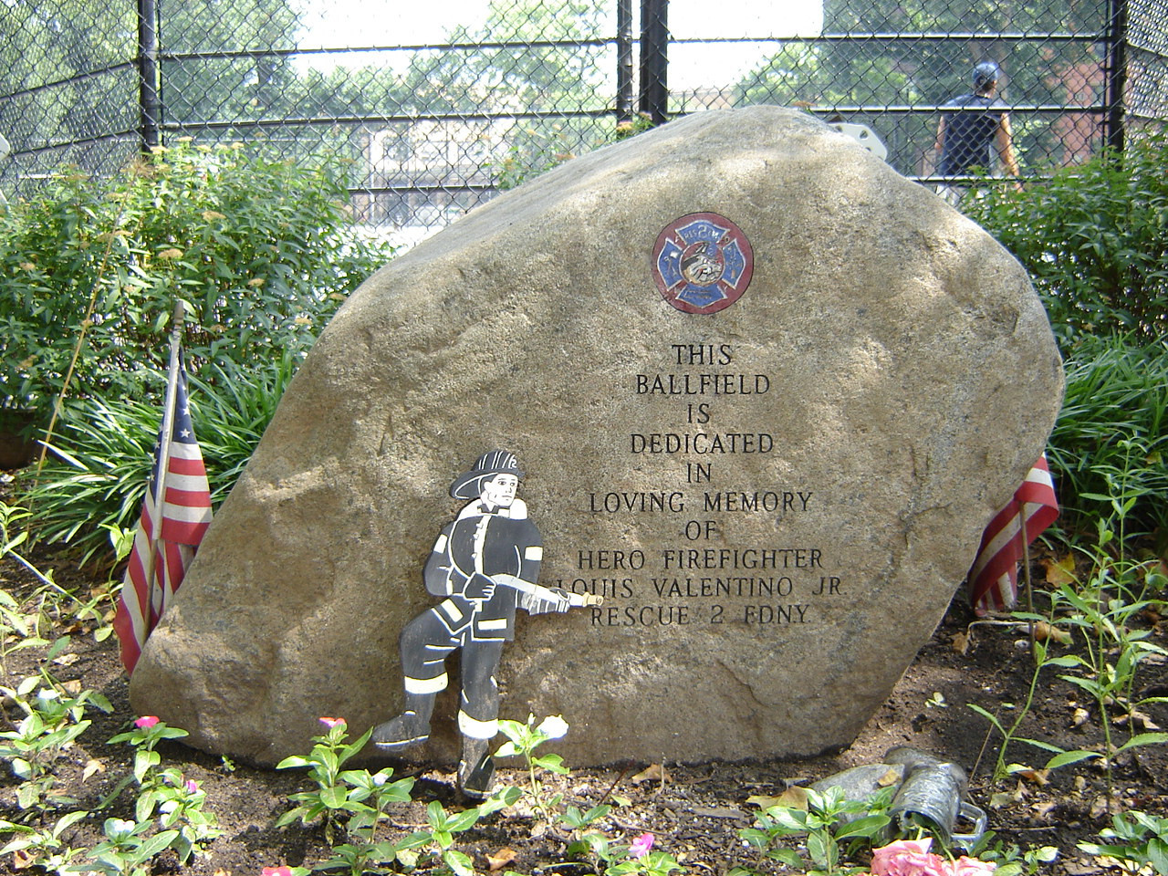 Inscribed stele and boulder