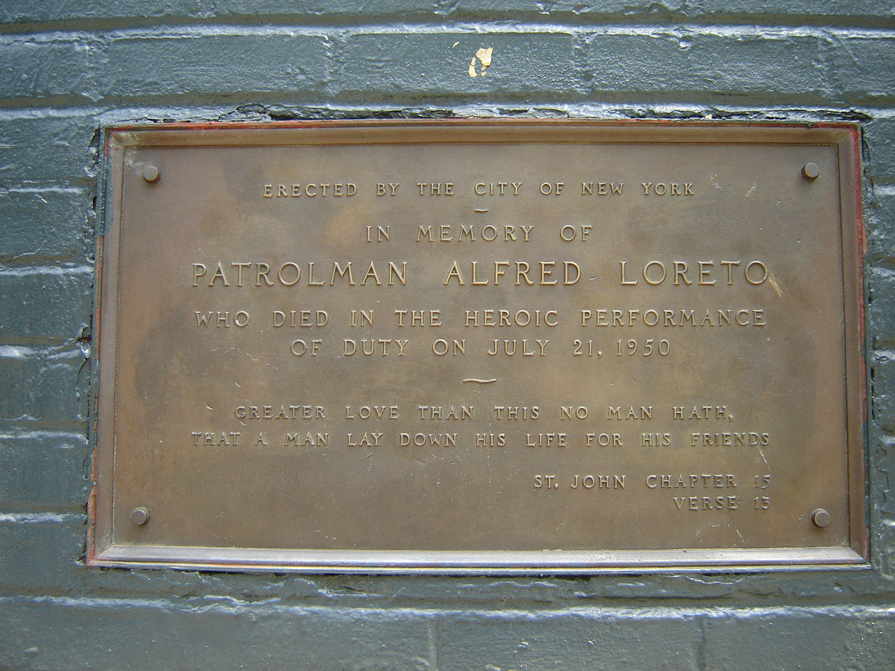 Two plaques on west side of fieldhouse