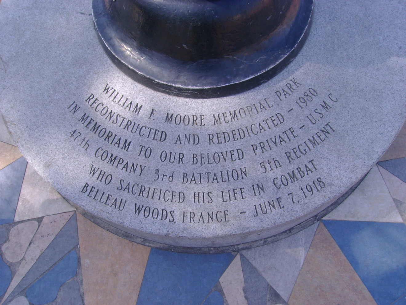 Flagstaff base, incised letters