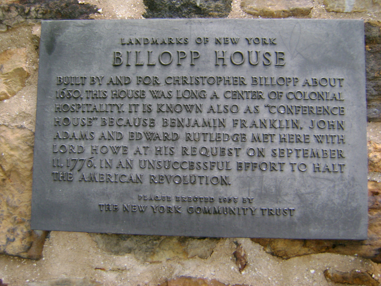 Plaque on exterior wall