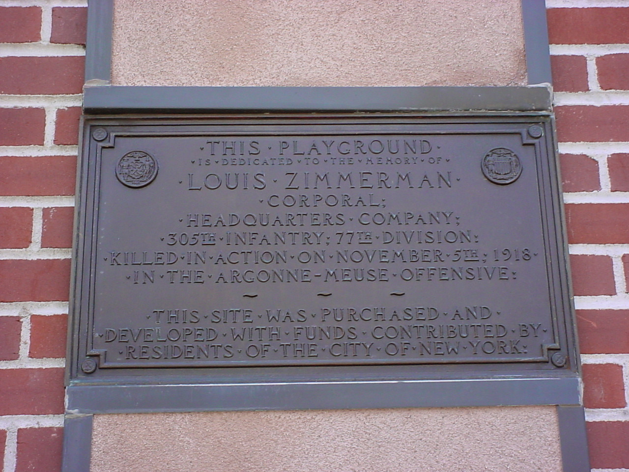 Plaque recessed into wall