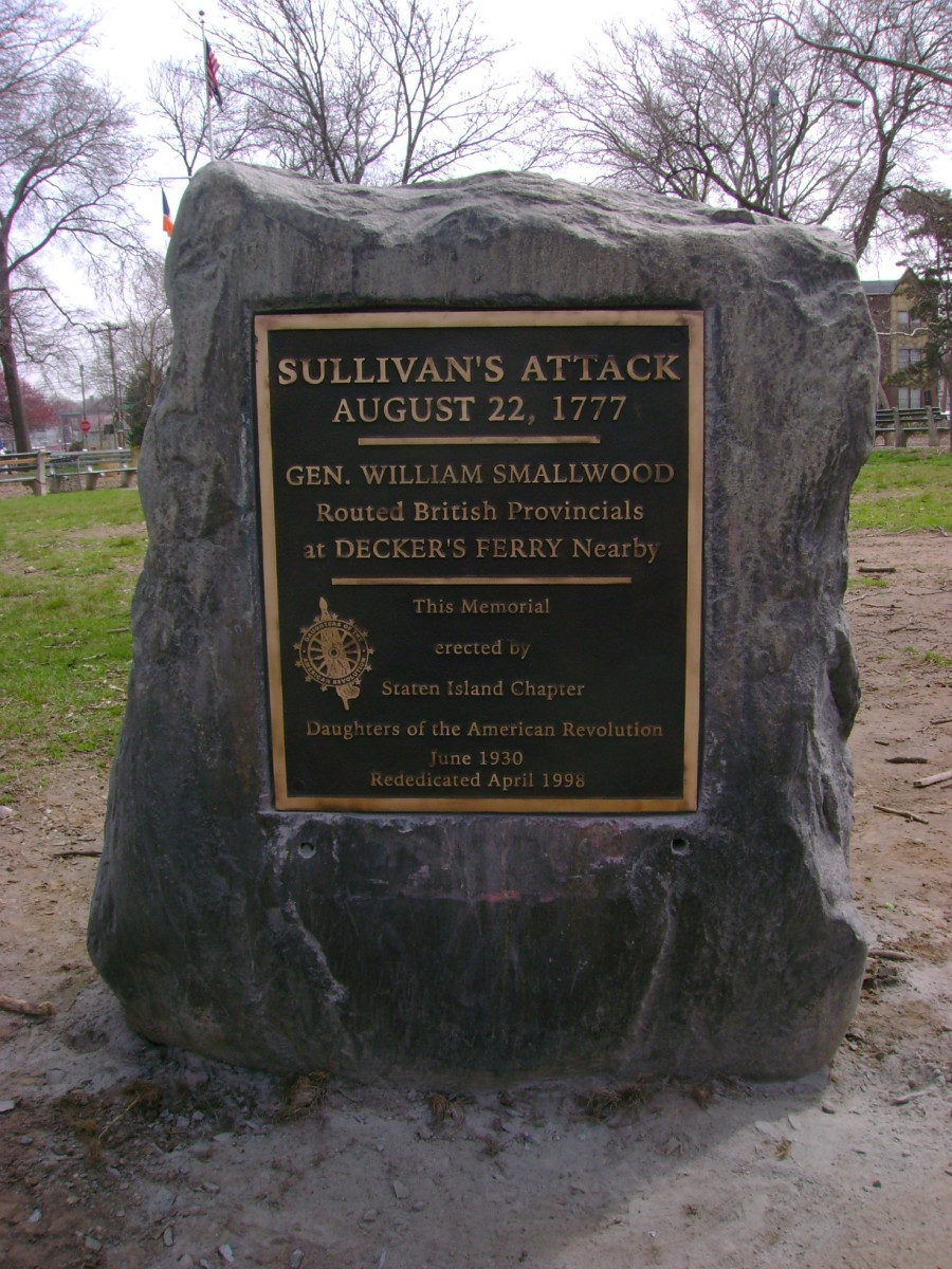 Bronze plaque attached to natural boulder