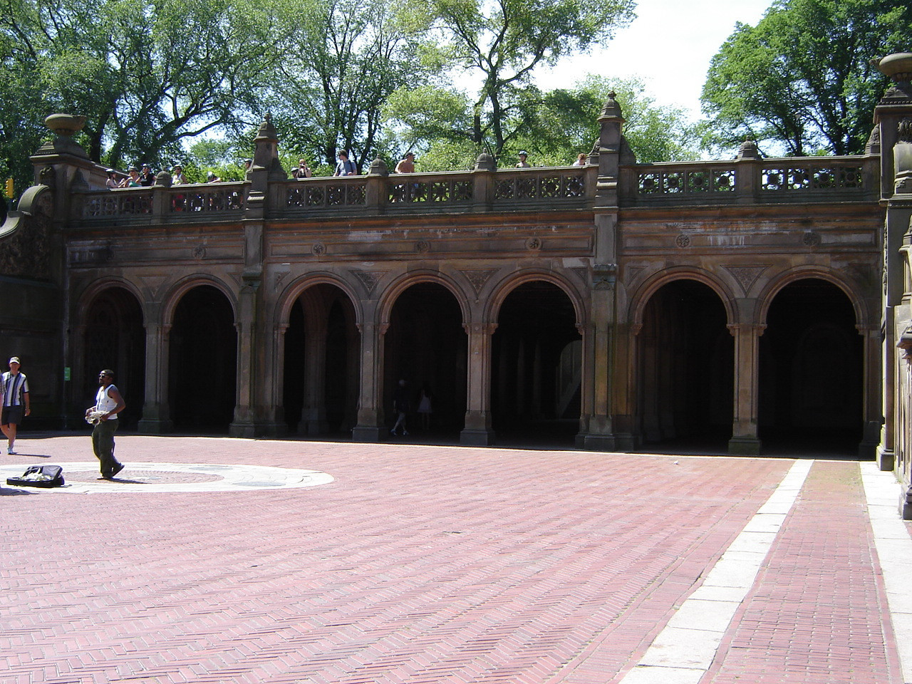 Arcaded structure with decorative ceiling panels of Minton tiles; exterior has carved limestone decorations