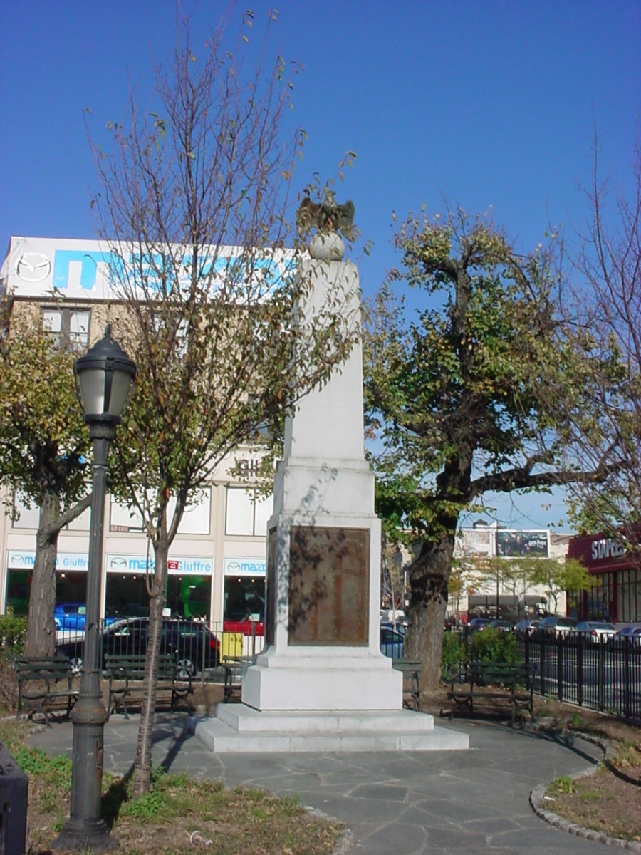 Obelisk topped by eagle, four plaques