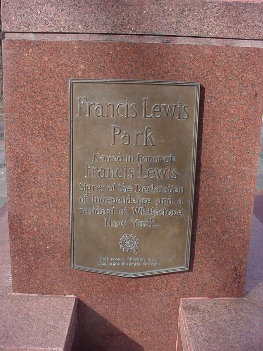 Plaque on base of flagstaff