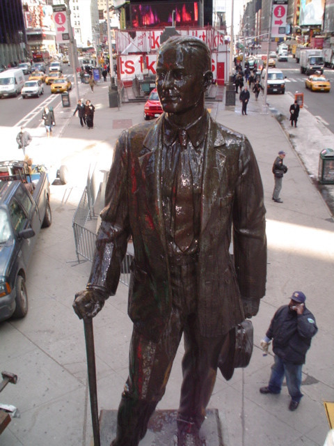 Standing figure (over life size), integral plinth, on pedestal