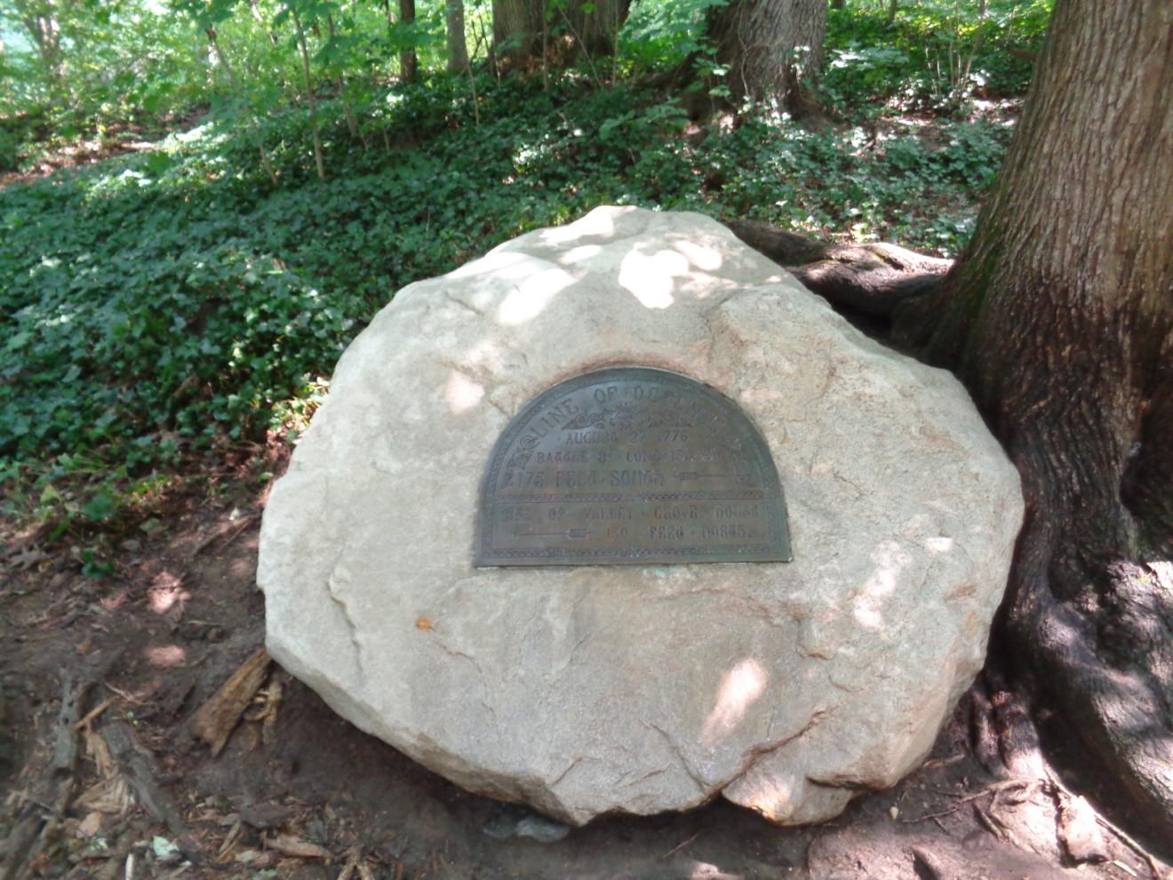 Semi-circular tablet on boulder