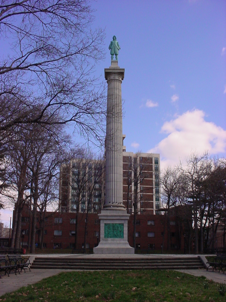 Doric column, panels, statue