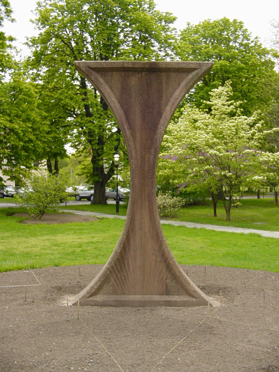 Upright X-form on plinth