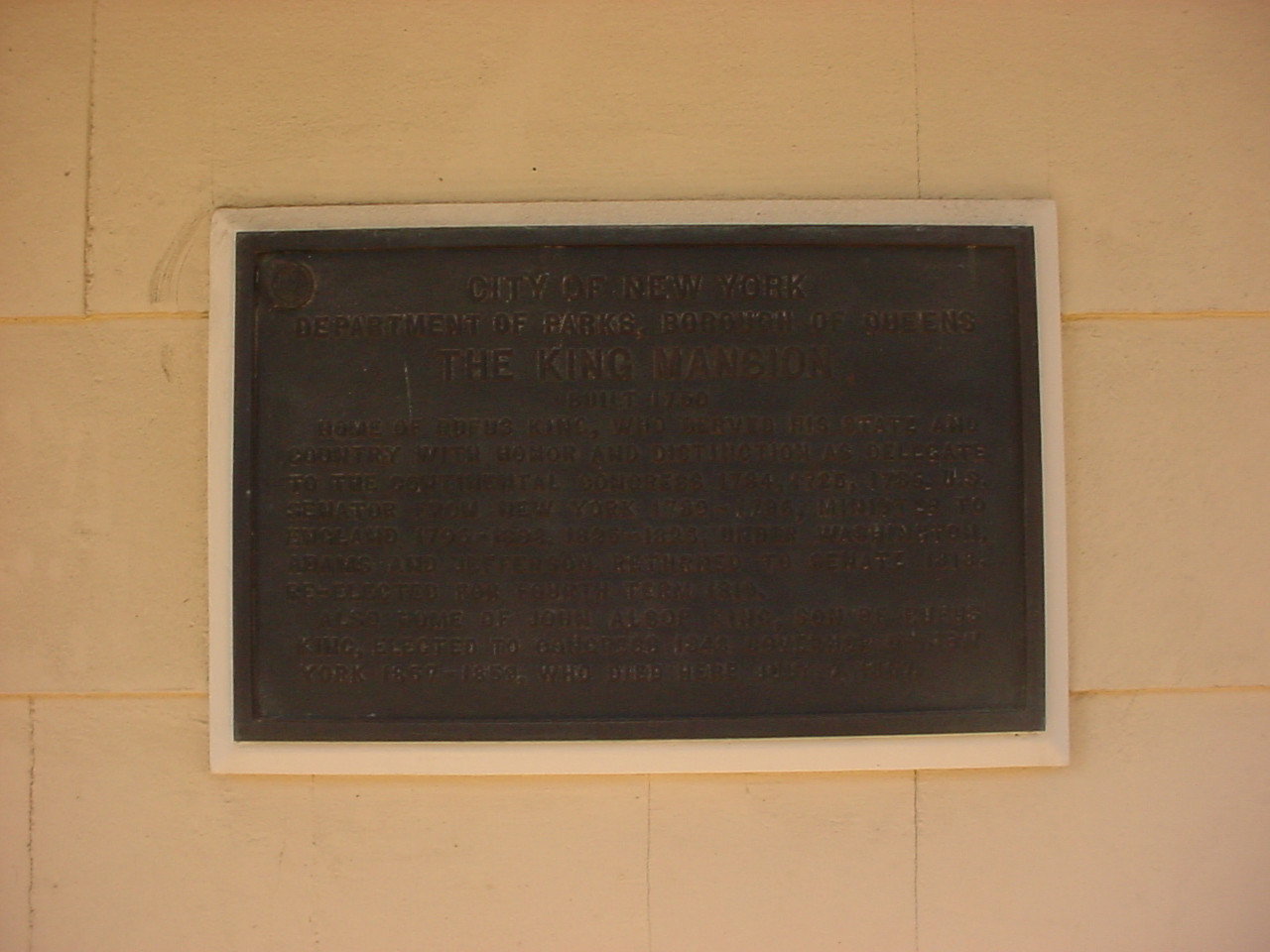 Plaque on exterior wall