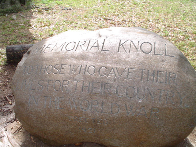 Boulder with incised inscription