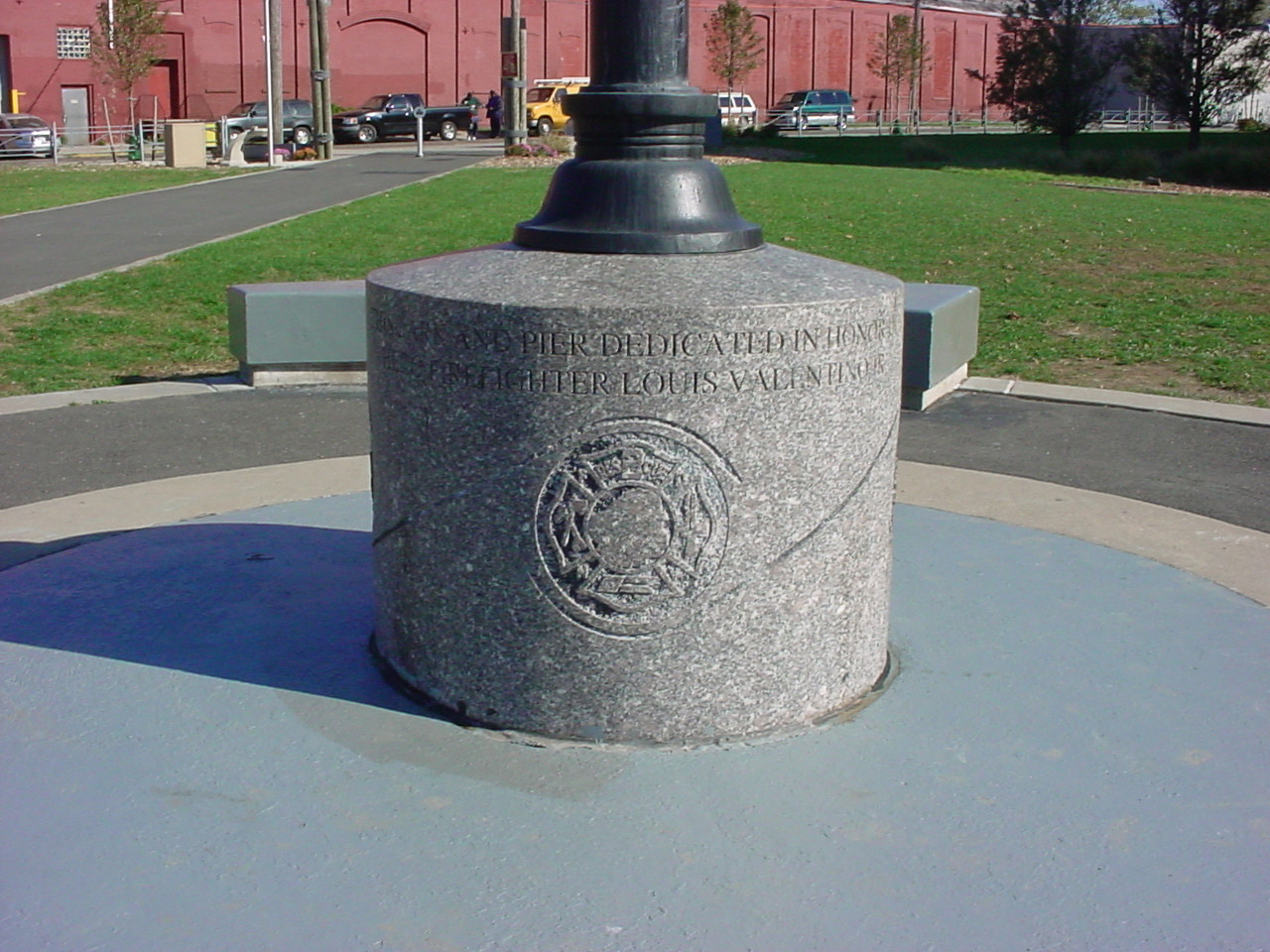 Flagstaff on cylindrical base with sloping top