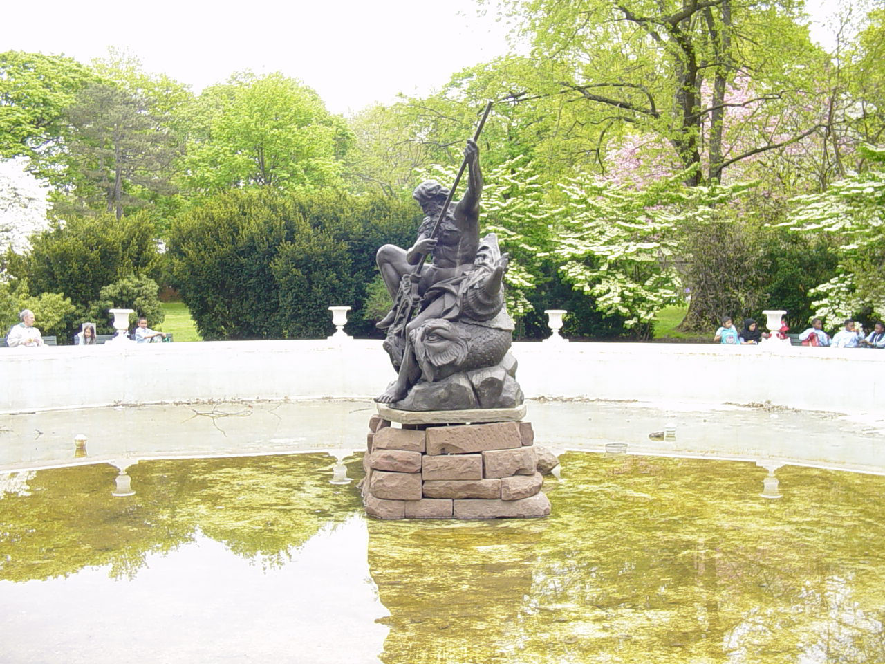 Male figure (heroic scale) atop basin; original zinc figure is Visitor's Center