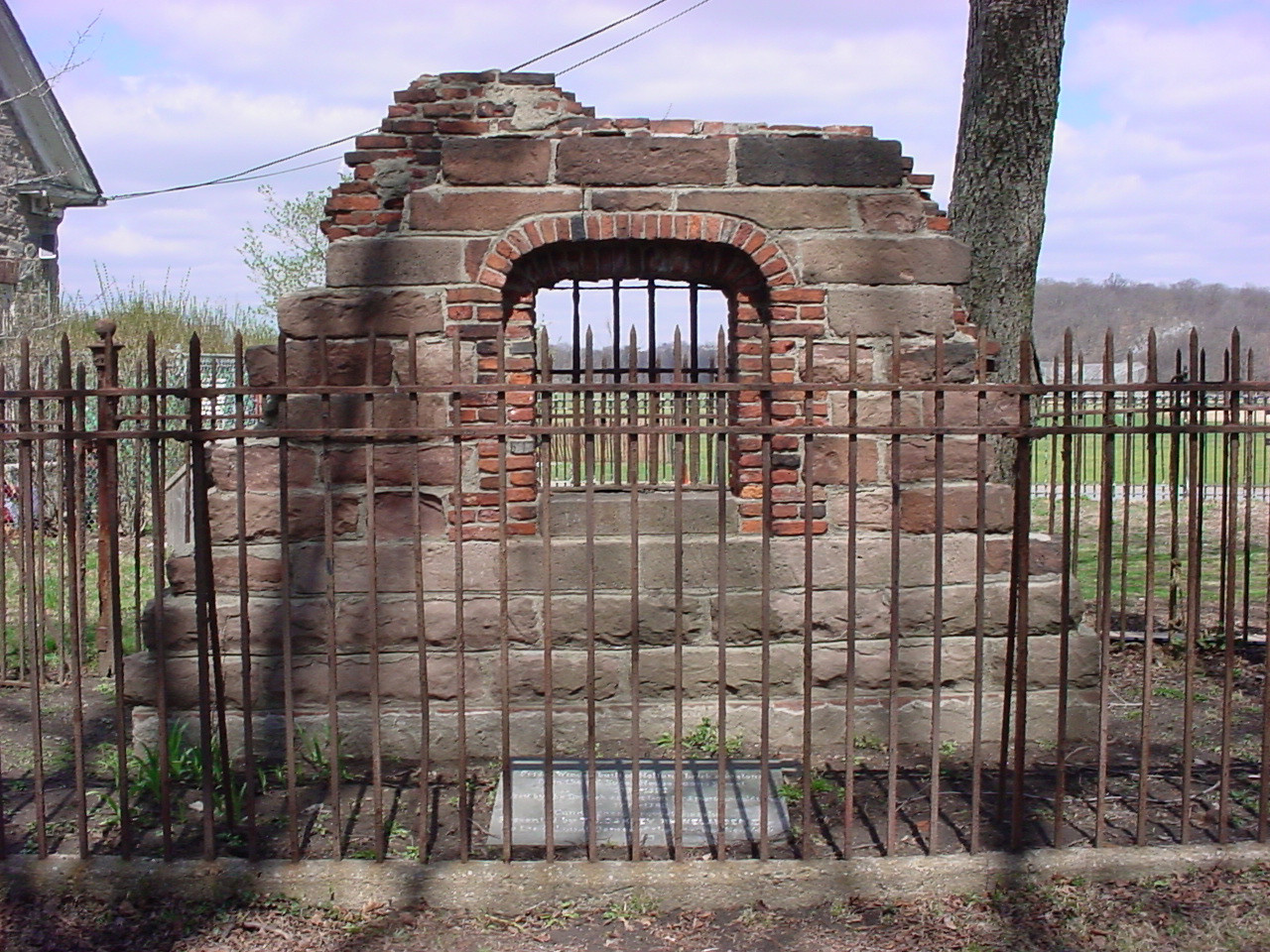 Ruins of old prison with tablet