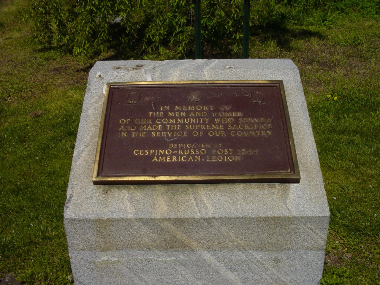 Tablet on plinth and flagstaff