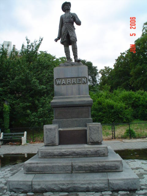 Standing figure (over life-size) on pedestal, two plaques