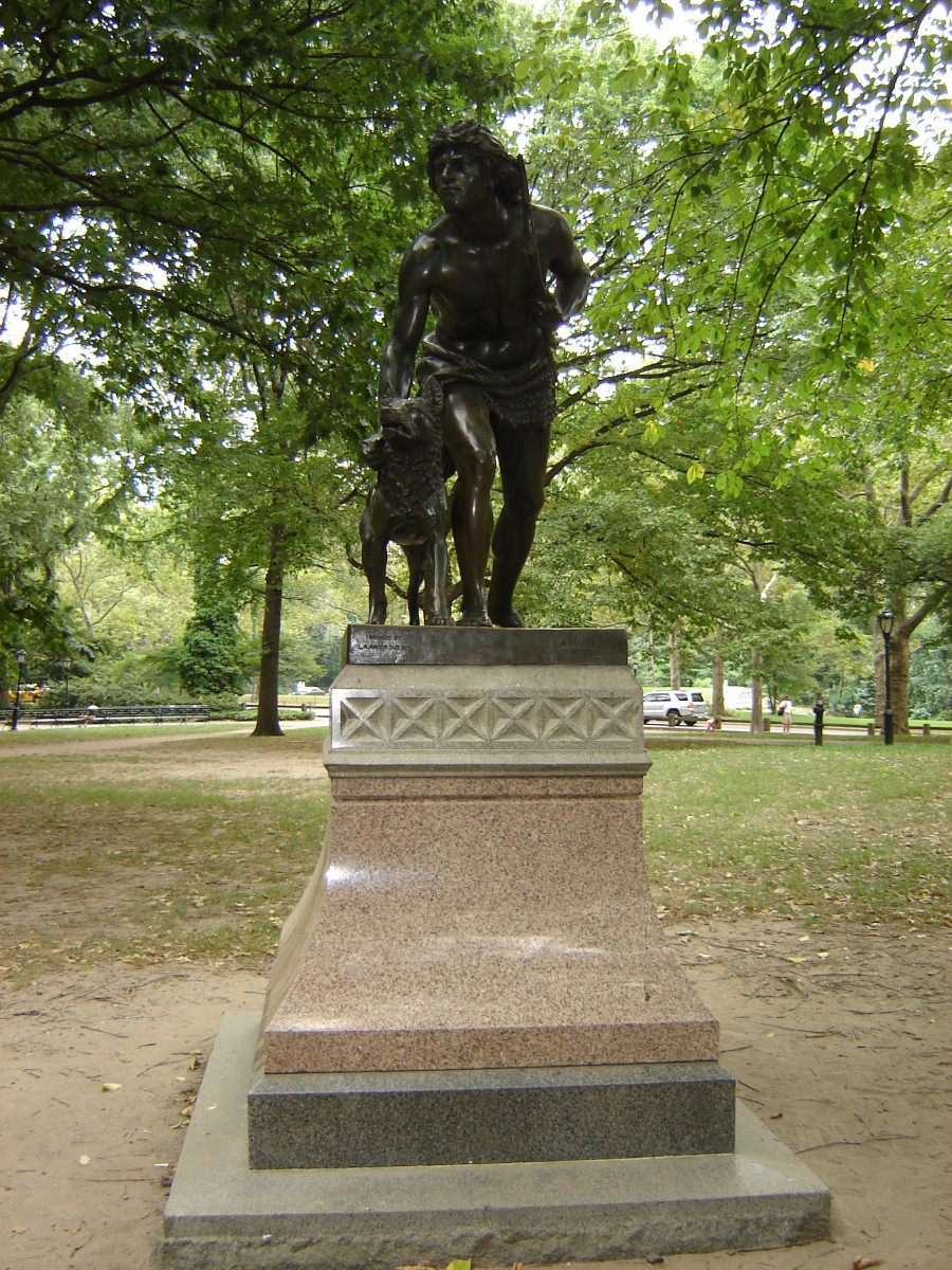 Figure (over life-size) and dog on pedestal