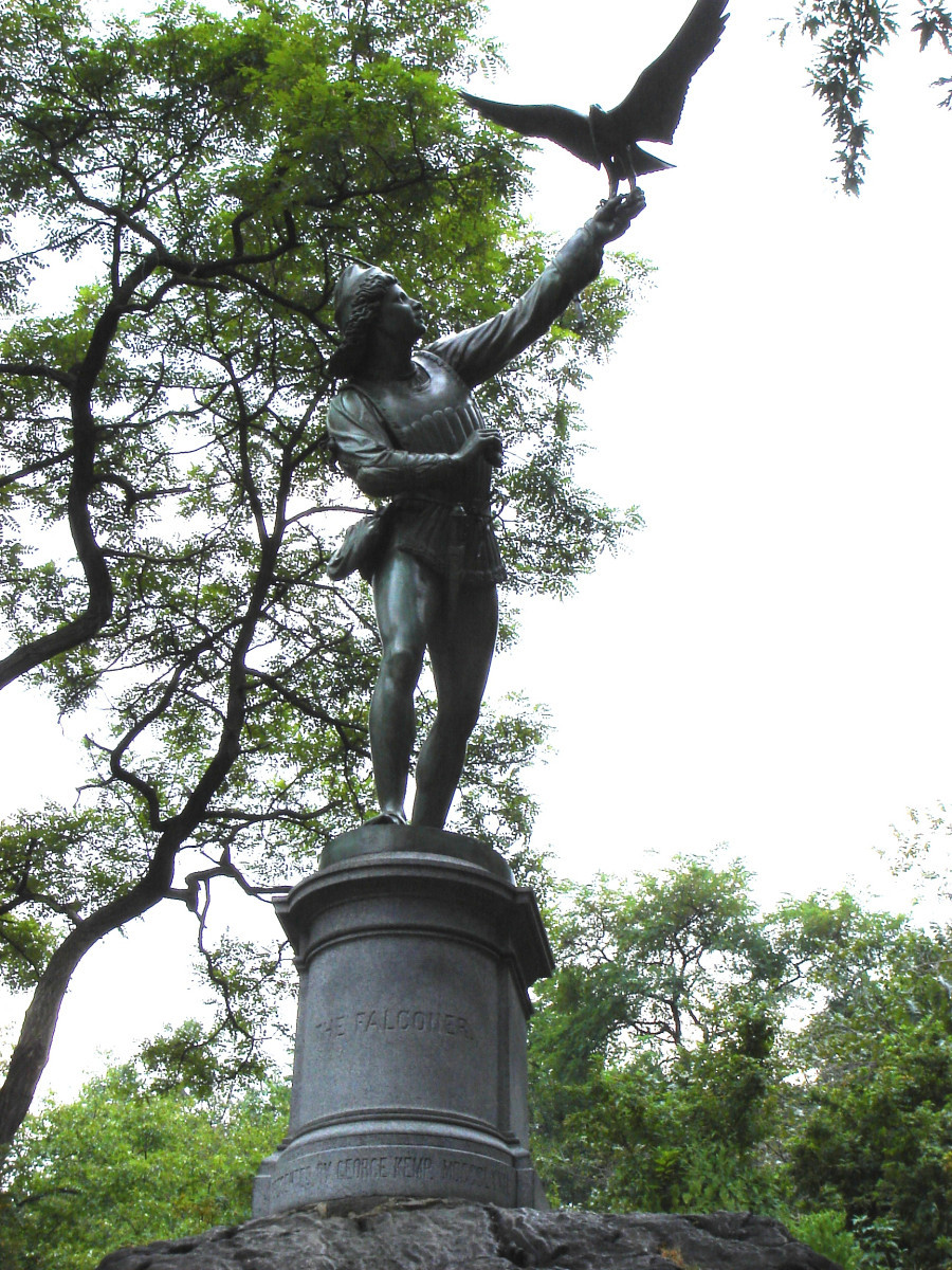 Standing figure (over life-size) holding bird aloft on integral plinth, on pedestal