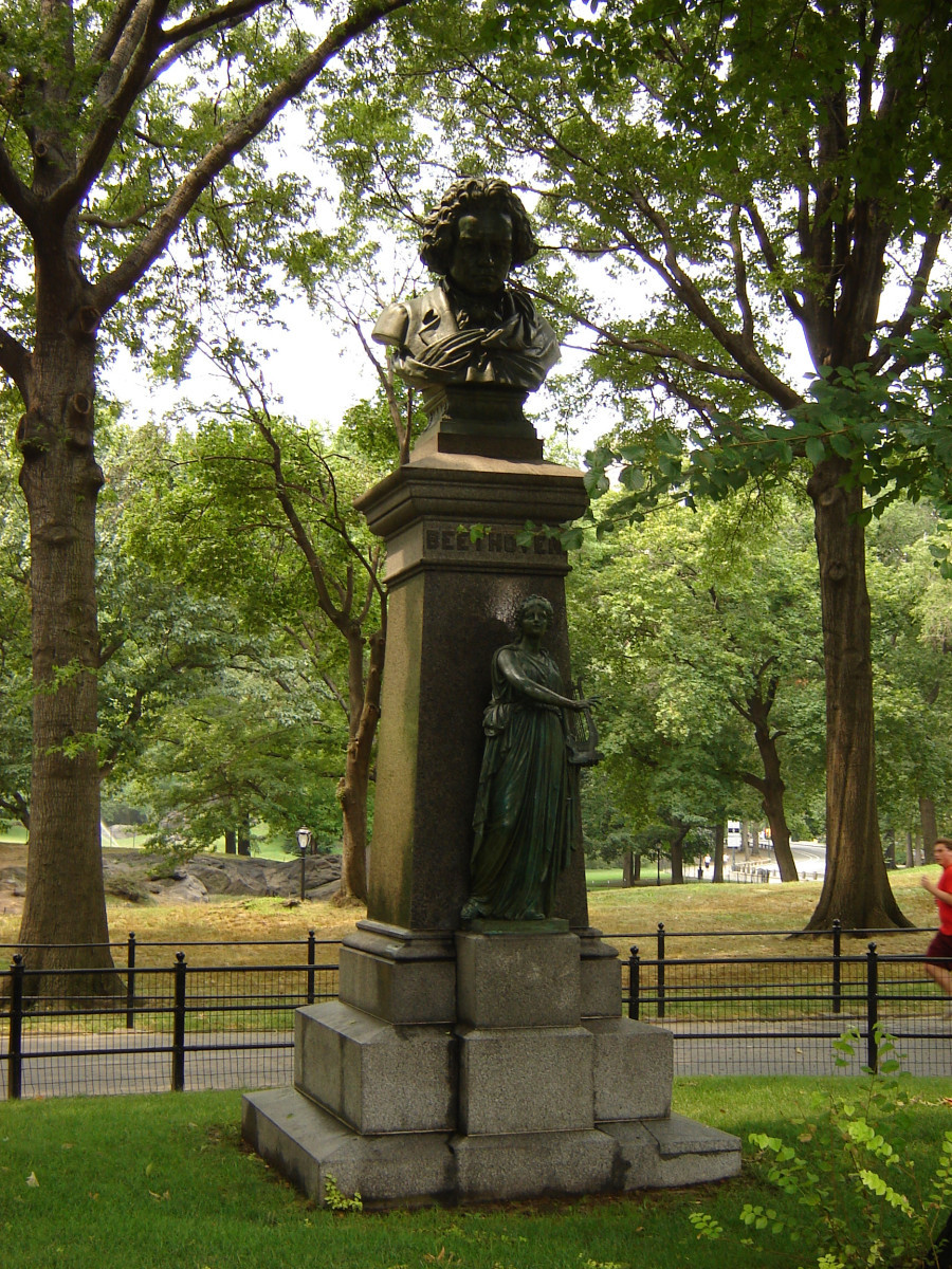 Bust, allegorical figure on pedestal