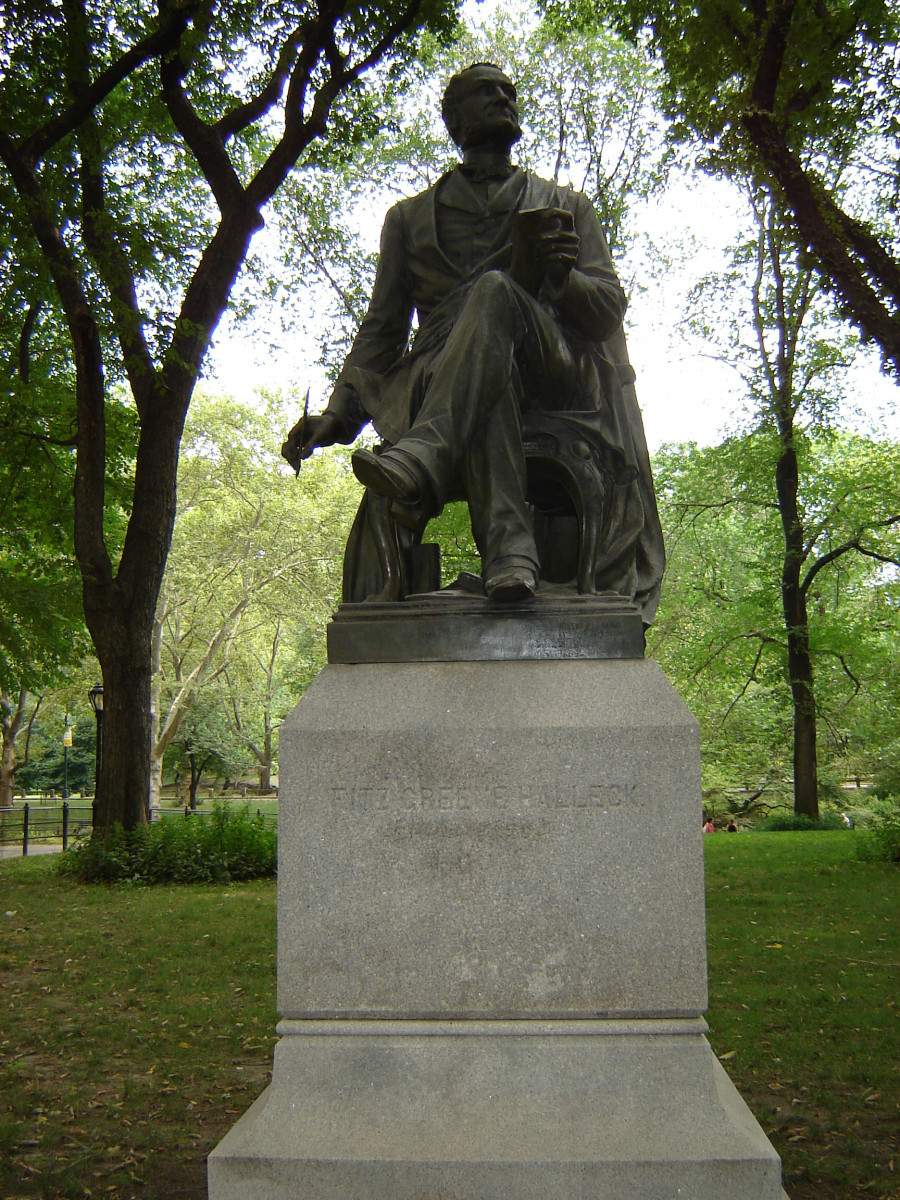 Seated figure (over life-size) on integral plinth, on pedestal