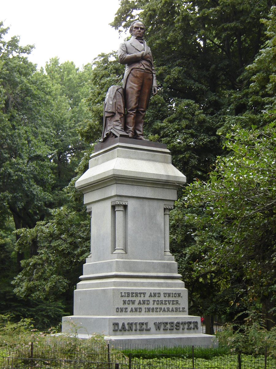 Standing figure with intergral plinth, on pedestal