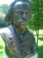 Bust on pedestal with plaque