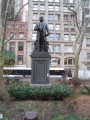 Standing figure (heroic scale) on integral plinth on pedestal