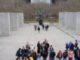 Eagle on pedestal between two ranks of four inscribed pylons (eight pylons in all; axis aligned with Statue of Liberty)