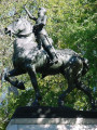 Equestrian figure (over life-size) on integral plinth on pedestal