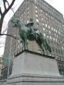 Equestrian figure (over life-size) with integral plinth on a pedestal that rests on a base that allows the monument to sit at the top of a staircase