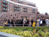 Commemorative wall with inscribed names; plaza