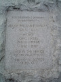 Boulder with incised inscription