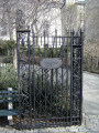 Two-leaved gate ornamented with animal figures; mounted plaque