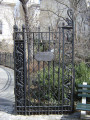 Two-leaved gate ornamented with animal figures; mounted plaque