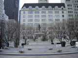 Fountain with sculptures: five basins in a stepped pattern support at their highest point a sixth, shell-form basin holding a standing female figure (over life-size); two rams-head horns of plenty  flank the third basin