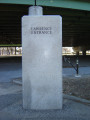 2 upright triangular stele; one has incised painted inscription