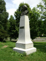 Bust on pedestal with plaque